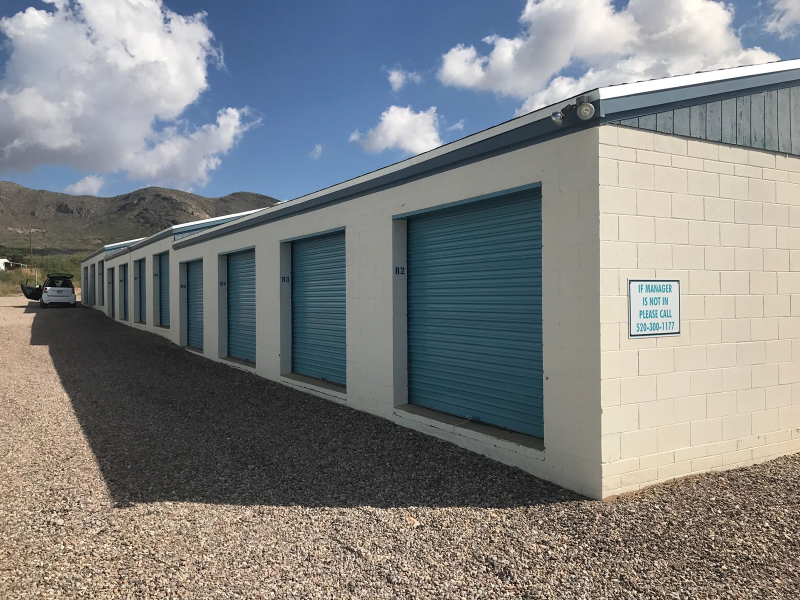 Row of storage garages in sunlight