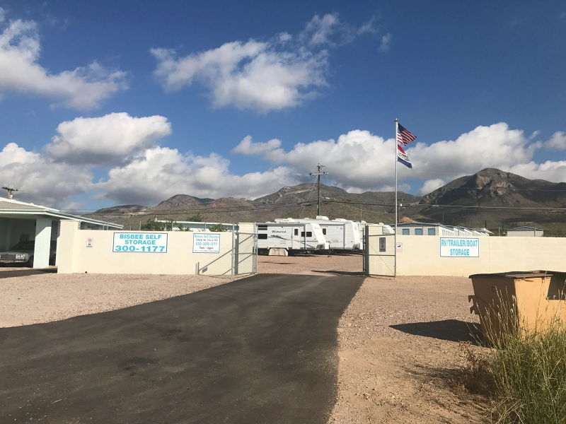 Storage facility entrance with mountain backdrop